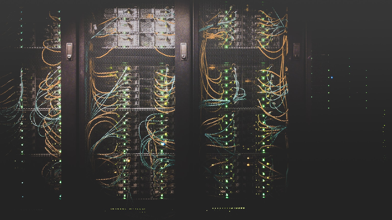 Engineers monitoring a modern network operations center